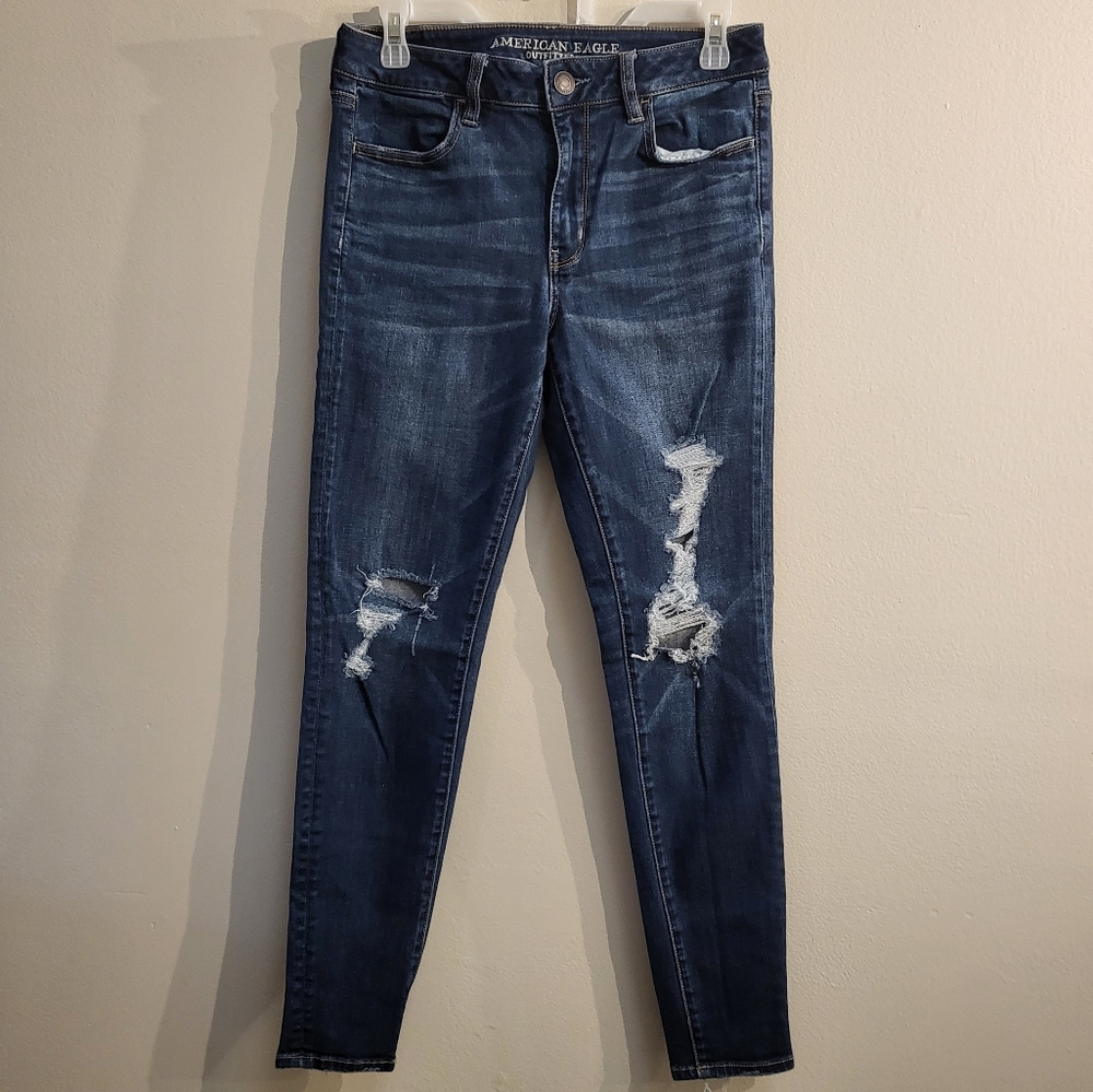 American Eagle Women's Outfitters Super Stretch Distressed Blue Jeans.  …
